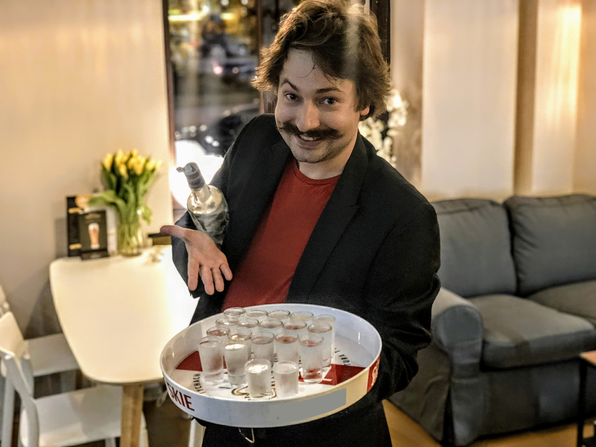A private group enjoying vodka and Polish food pairings on a tasting tour