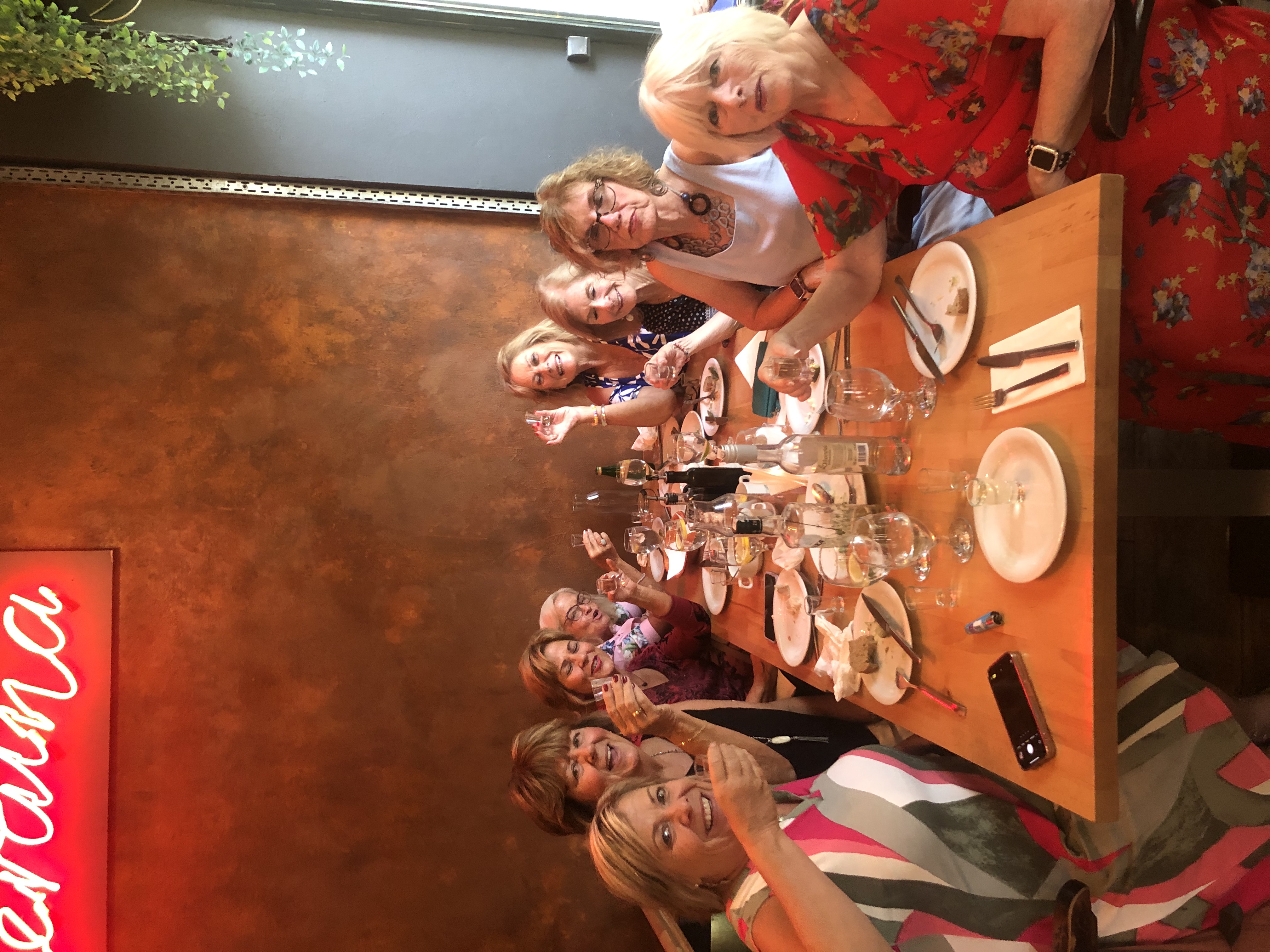 Guests sharing a relaxed Polish vodka tasting at a central city venue