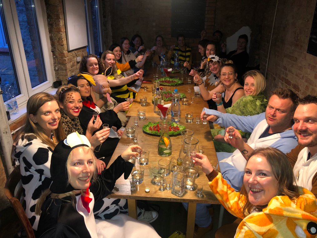 Guests sharing a relaxed Polish vodka tasting at a central city venue