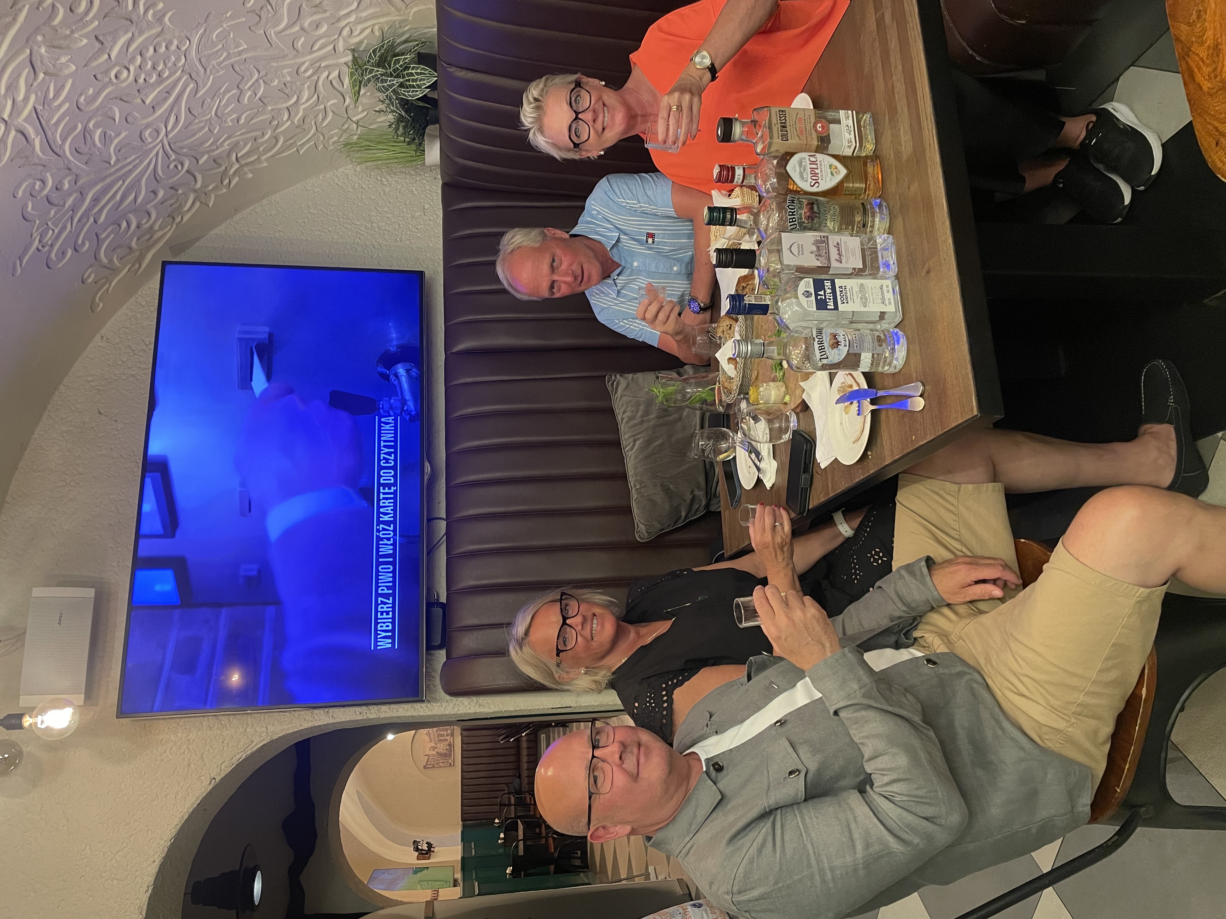 A private group enjoying vodka and Polish food pairings on a tasting tour