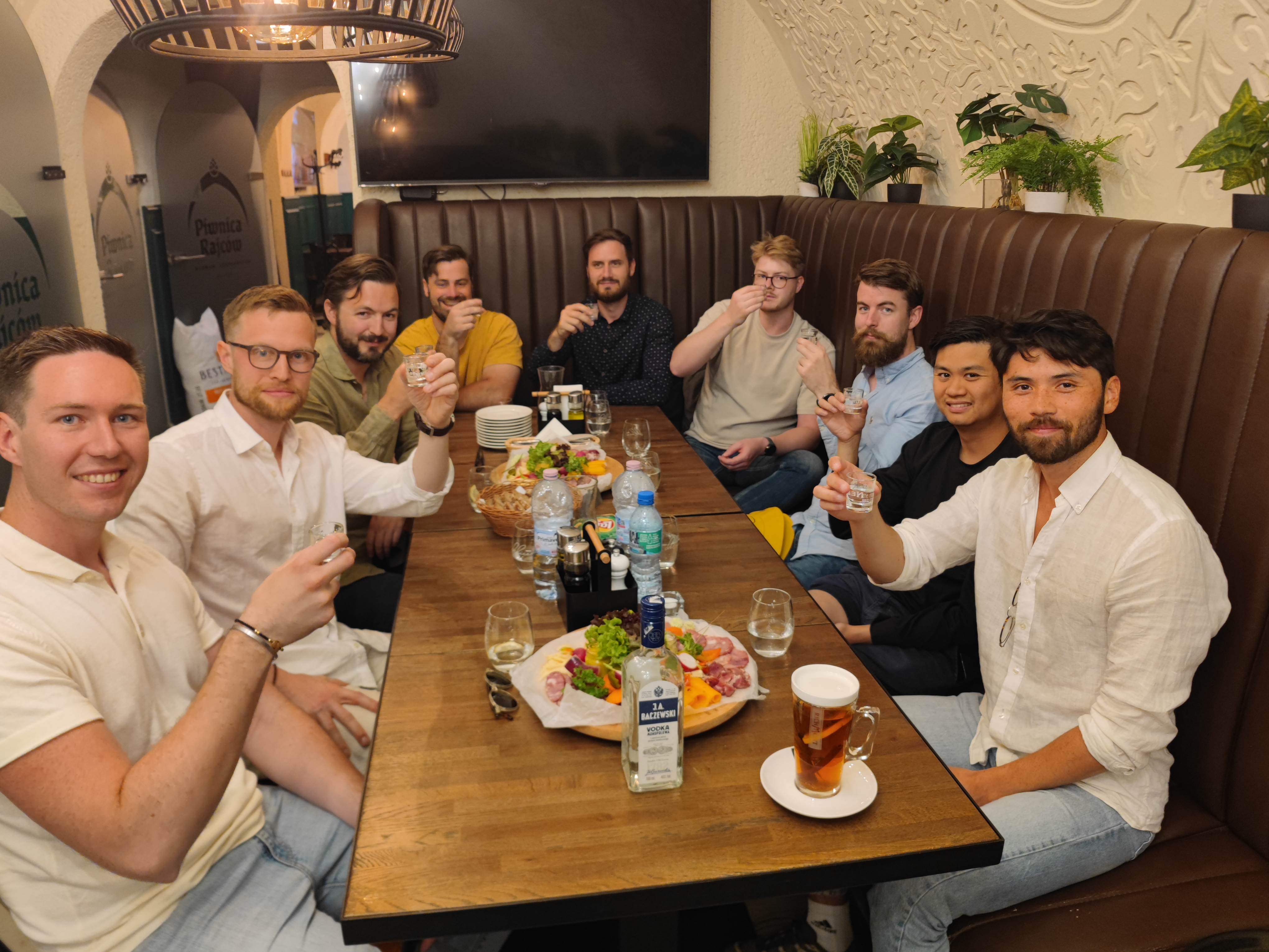 Friends discovering traditional Polish vodkas with a local tasting host