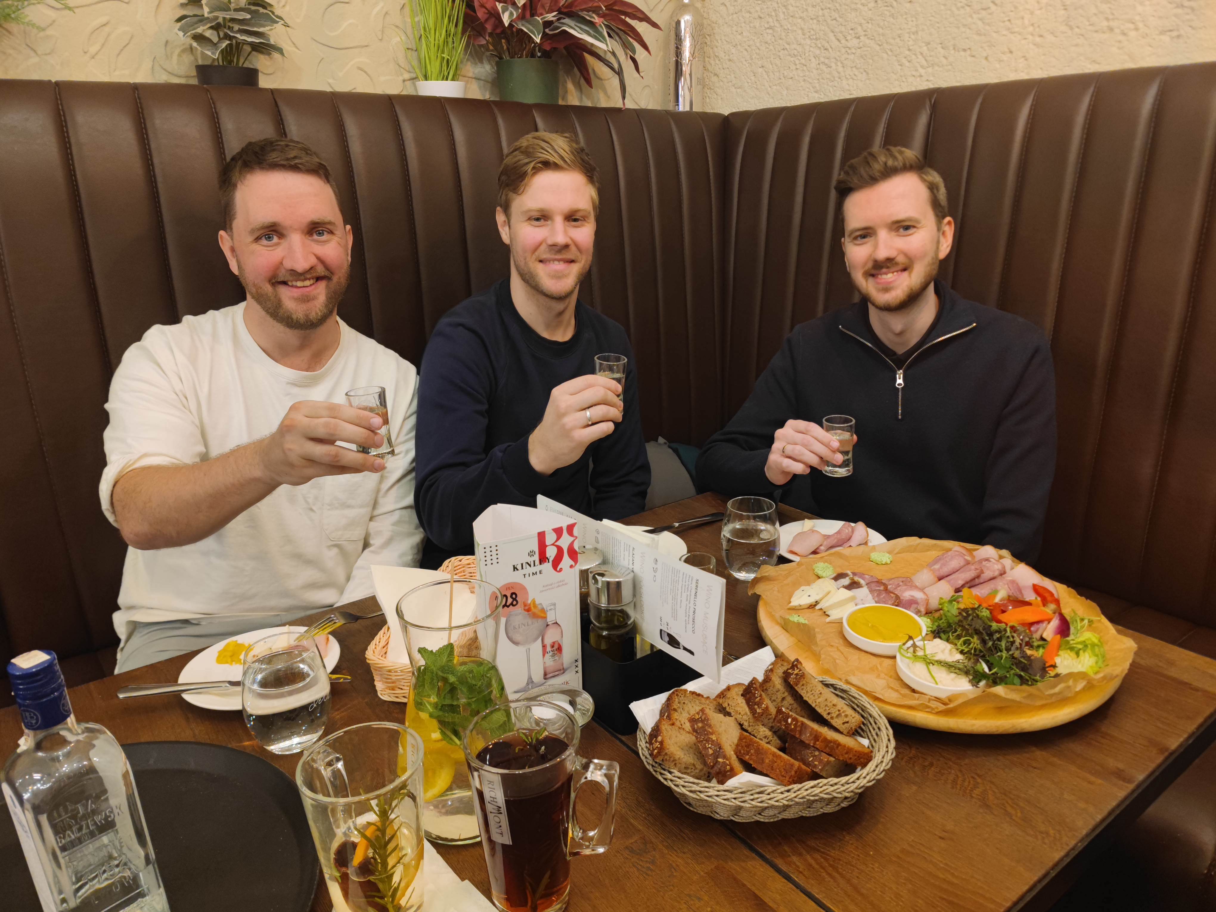 A group of friends enjoying a guided Polish vodka tasting together