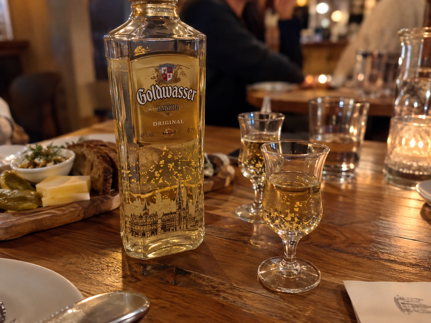 A bottle of Goldwasser with floating gold flakes.